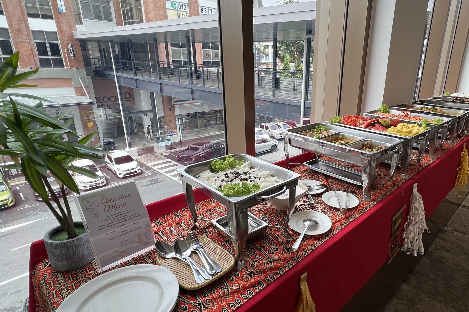Madli's buffet line with chafing dishes at a corporate event